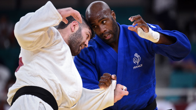 טדי רינר, אורי ששון (צילום: FRANCK FIFE/AFP via Getty Images)