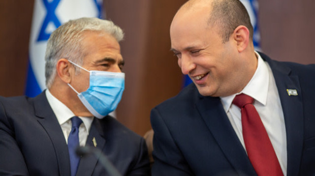 בנט ולפיד (צילום: אמיל סלמן/הארץ)