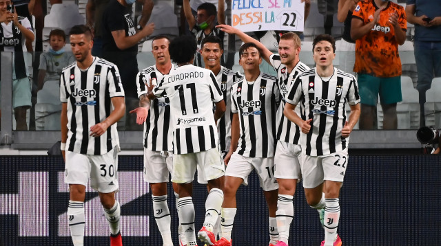 שחקני יובנטוס חוגגים (צילום: MARCO BERTORELLO/AFP via Getty Images)