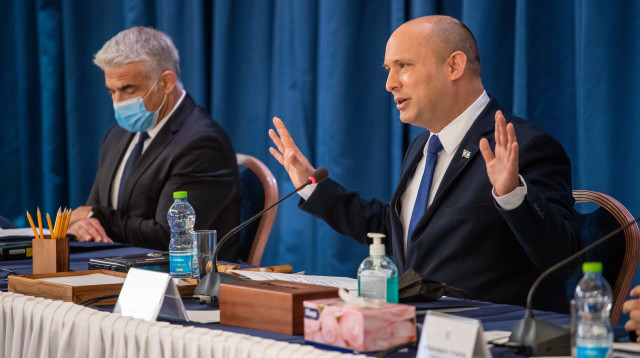 נפתלי בנט ויאיר לפיד (צילום: אמיל סלמן/הארץ)