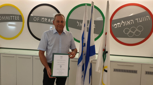 יו"ר הוועד האולימפי בישראל יגאל כרמי (צילום: אתר רשמי, באדיבות הוועד האולימפי בישראל)