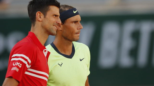 רפאל נדאל טניסאי ספרדי עם נובאק דג'וקוביץ' טניסאי סרבי (צילום: רויטרס)