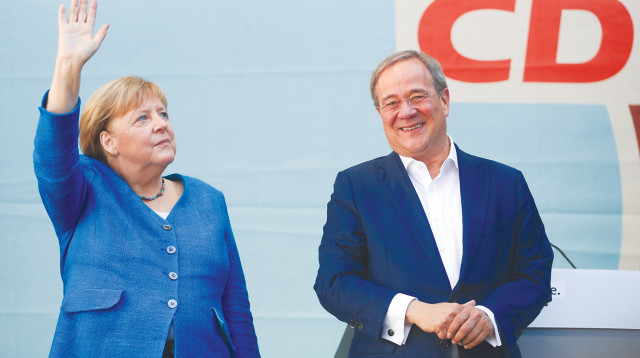 אנגלה מרקל וארמין לאשט, צילום רויטרס, RC2YWP91W6R6 (צילום: רויטרס)