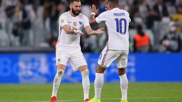 החזירו את הטריקולור למשחק. אמבפה ובנזמה (צילום: GettyImages, Laurence Griffiths)