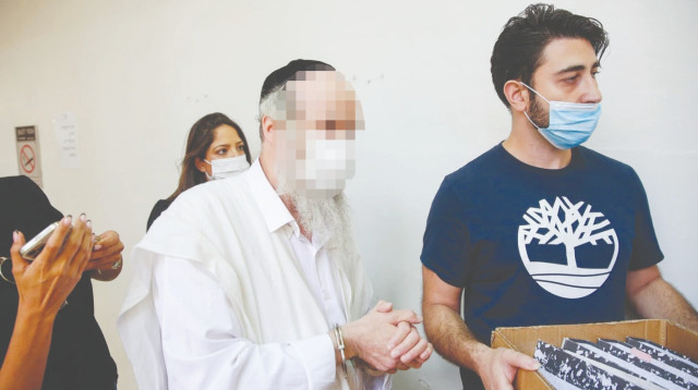 מעצרו של אחד החשודים ברצח ובהיעלמות בירושלים (צילום: שלו שלום/TPS)