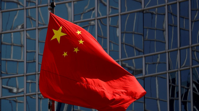 דגל סין (צילום: REUTERS/Thomas Peter/File Photo)