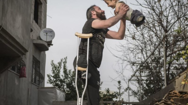 הצילום של מונזיר ובנו מוסטפא  (צילום: אתר רשמי, מהמט אסלן, תחרות הצילום סיינה)