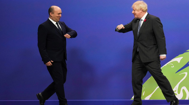 נפתלי בנט ובוריס ג'ונסון בוועידת האקלים  (צילום: רויטרס)