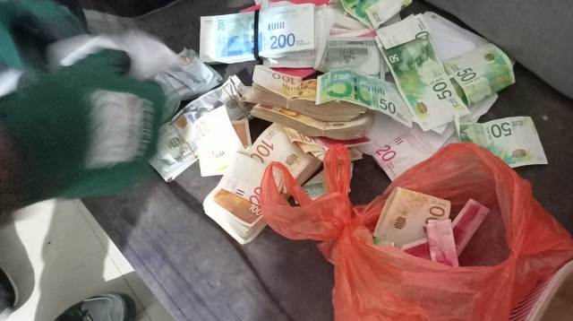 הכסף שנתפס (צילום: באדיבות המצלם)