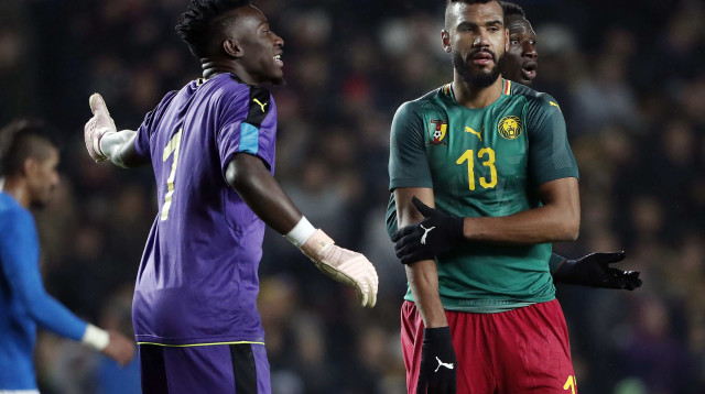 חולמים על היסטוריה ביתית. אריק מקסים שופו-מוטינג עם אנדרה אונאנה (צילום: GettyImages, Soccrates Images)