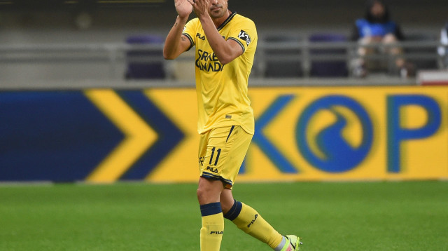 שחקן מכבי תל אביב טל בן חיים (צילום: ברני ארדוב)