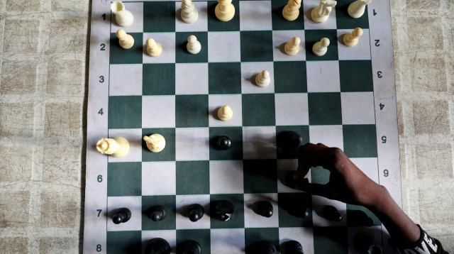 לוח שחמט (צילום: REUTERS/Temilade Adelaja)