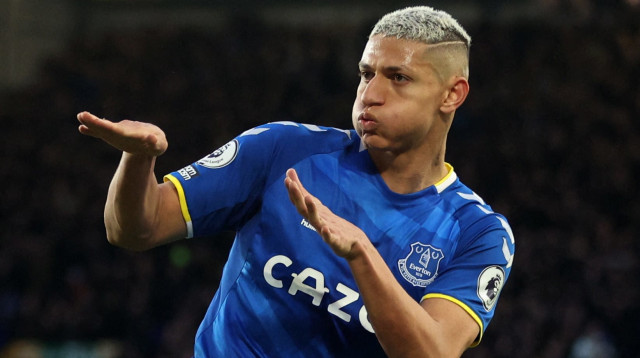 רישרליסון חוגג אחרי שבישל לגורדון (צילום: רויטרס)