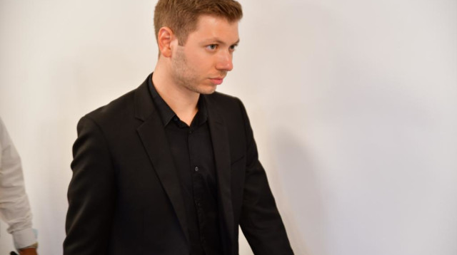 יאיר נתניהו בבית המשפט בתביעת הדיבה נגד אהוד אולמרט (צילום: אבשלום ששוני)