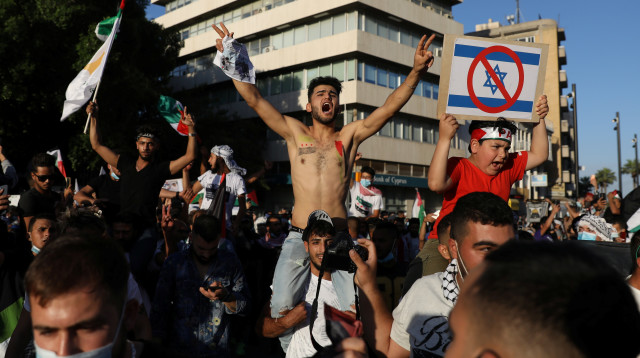 הפגנה נגד ישראל בקפריסין (צילום: REUTERS/Yiannis Kourtoglou)