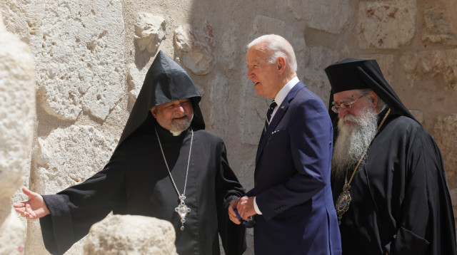 ג'ו ביידן בכנסיית המולד  (צילום: REUTERS/Evelyn Hockstein)