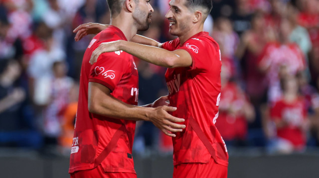 הלדר לופס ומיגל ויטור חוגגים (צילום: דני מרון)