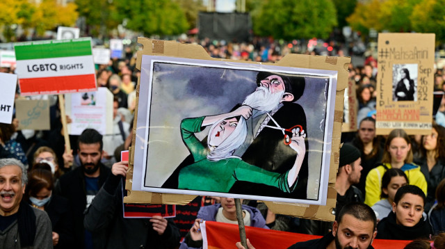 המחאה נגד המשטר באיראן (צילום: John MACDOUGALL / AFP)