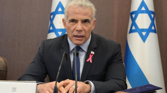 ראש הממשלה יאיר לפיד בפתח ישיבת הממשלה (צילום: עמוס בן גרשום לע"מ)