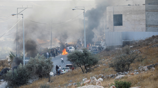 עימותים ביהודה ושומרון (צילום: REUTERS/Raneen Sawafta)