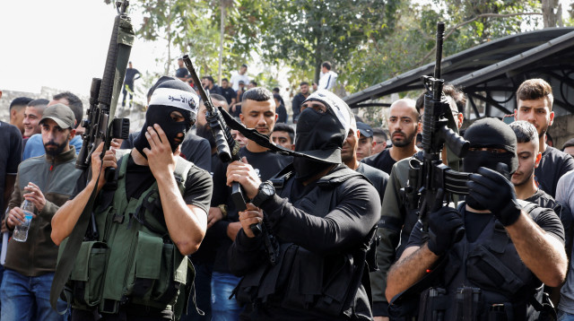 ארגון הטרור גוב האריות (צילום:  REUTERS/Raneen Sawafa)