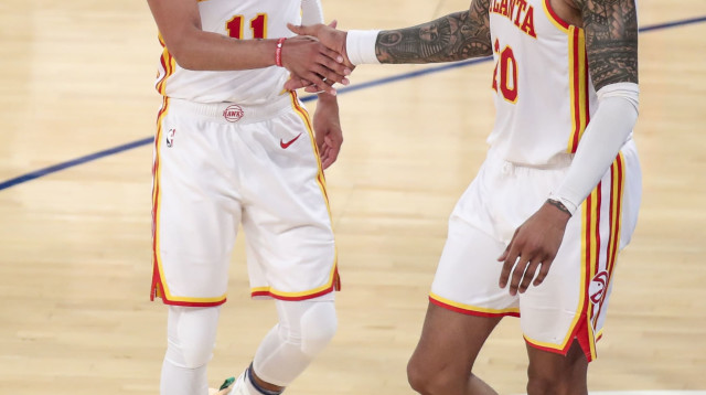 שחקני אטלנטה הוקס טריי יאנג, ג'ון קולינס חוגגים (צילום: רויטרס)