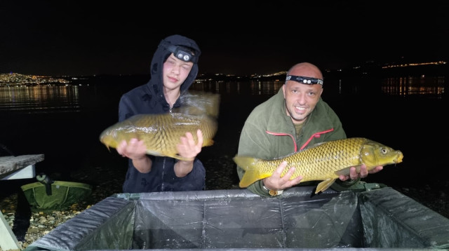 אבא ניקולאי והבן מייקל (צילום: עמותת ישראפיש)