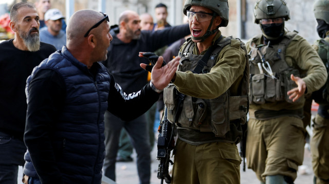 עימותים בחברון (צילום: רויטרס)
