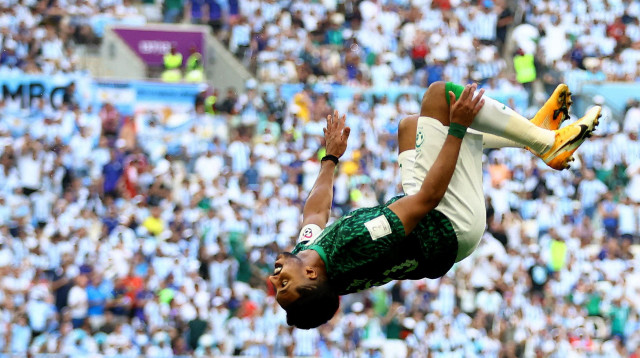 שחקן נבחרת ערב הסעודית סאלם אל-דווסארי חוגג מול ארגנטינה (צילום: רויטרס)