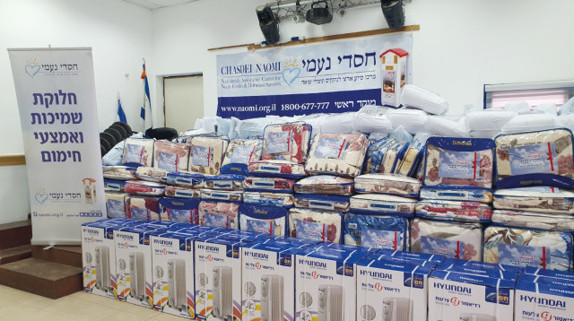 חלוקת תנורים בחסדי נעמי (צילום: עמותת חסדי נעמי)