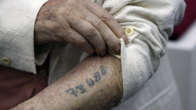 ניצול שואה (צילום:  REUTERS/Baz Ratner)