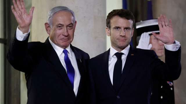 בנימין נתניהו, עמנואל מקרון (צילום: REUTERS/Benoit Tessier)