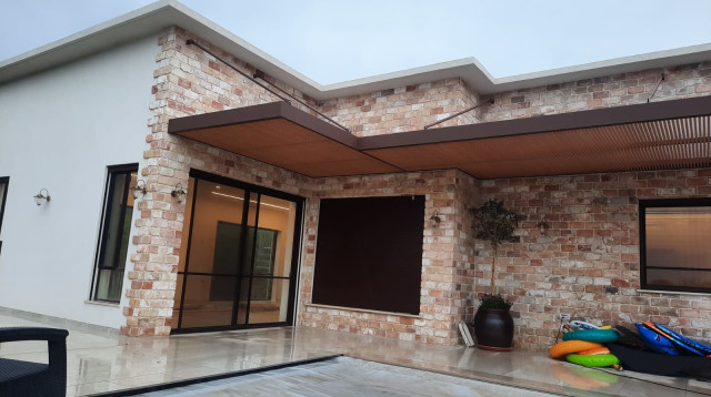 מערכת ההצללה המתאימה לגינה שלך: מדריך לפרגולות אלומיניום (צילום: יוניקיט הדסה)