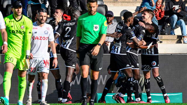 סנסציה אדירה. שחקני אנז'ה חוגגים (צילום: GettyImages, DAMIEN MEYER/AFP)