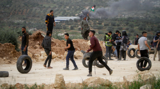 עימותים בין פלסטינים וכוחות צה"ל בשטחים (צילום: נאסר אישתיה, פלאש 90)