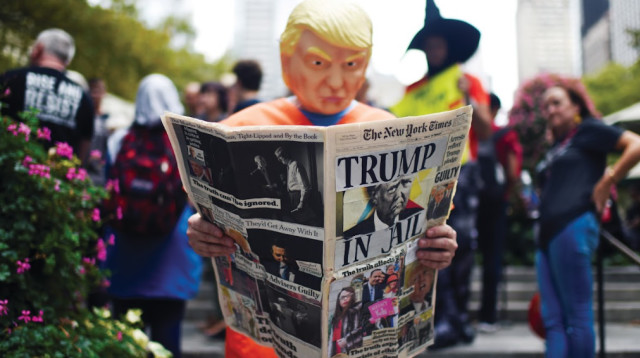 מפגין נגד דונלד טראמפ (צילום: ארכיון רויטרס)