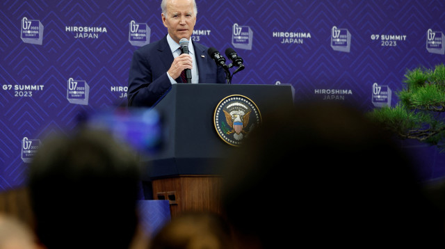 הנשיא ג'ו ביידן במסיבת העיתונאים בהירושימה, יפן  (צילום: Kiyoshi Ota/Pool via REUTERS)