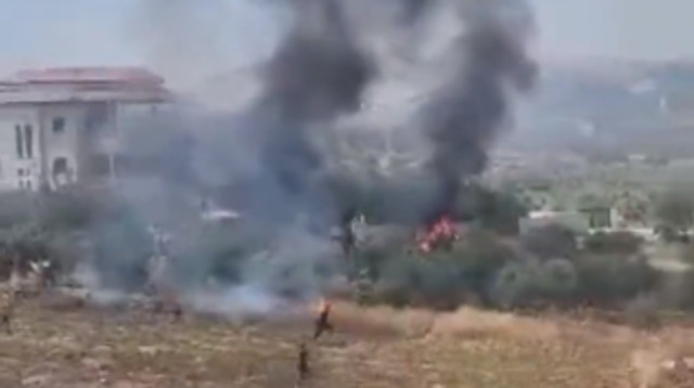 מתנחלים הציתו שדות בכפר תורמוס ליד רמאללה (צילום: רשתות פלסטיניות)