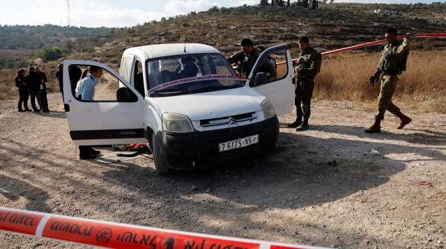 זירת הפיגוע סמוך לקדומים (צילום: REUTERS/ Ammar Awad)