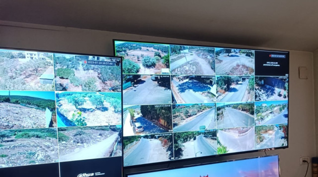 שידור צילומי מצלמות ארגון הפשיעה של בכרי (צילום: דוברות המשטרה)