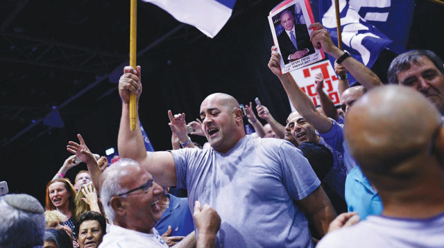 איציק זרקא בהפגנה (צילום: תומר נויברג, פלאש 90)