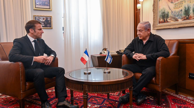 בנימין נתניהו, עמנואל מקרון (צילום: קובי גדעון, לע"מ)