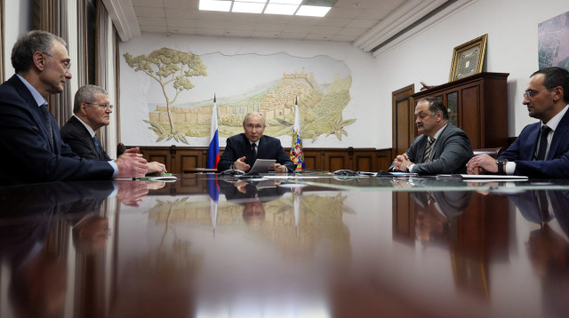 פוטין מבקר בדאגסטן (צילום: Sputnik/Gavriil Grigorov/Kremlin via REUTERS)