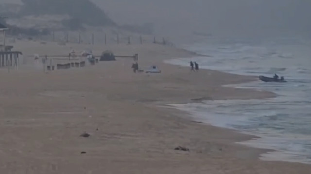 חדירת מחבלי חמאס לחוף זיקים (צילום: מצלמות אבטחה)