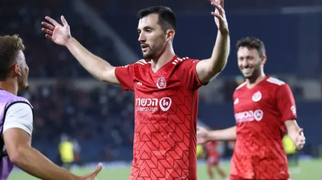 שוב להט מול היריבה האהובה עליו. אוז'בולט (צילום: דני מרון)