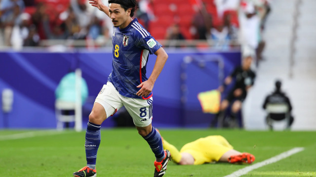 טאקומי מינאמינו, שחקן נבחרת יפן (צילום: GettyImages, Zhizhao Wu)