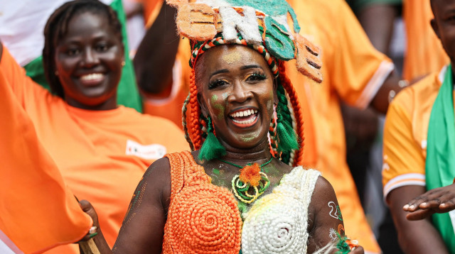אוהדת חוף השנהב באליפות אפריקה (צילום: GettyImages, FRANCK FIFE/AFP)