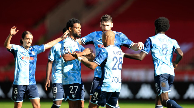 שחקני לה האבר חוגגים (צילום: GettyImages, VALERY HACHE/AFP)