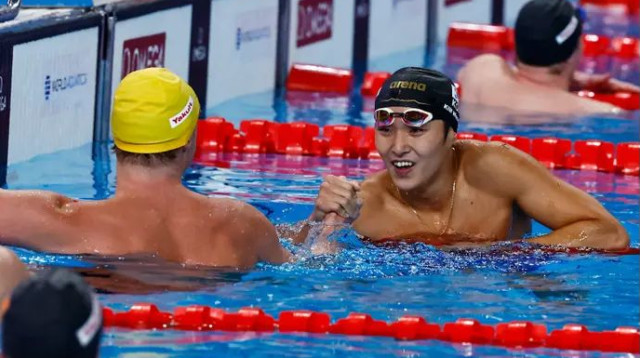 החיוך לא ירד מהפנים. וו-מין קים (צילום: רויטרס)