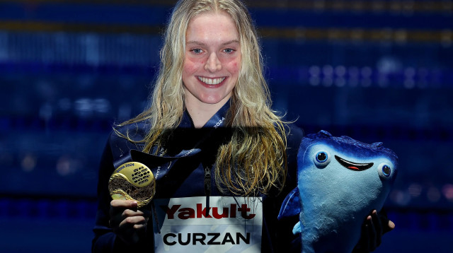 קלייר קורזן שחיינית אמריקנית (צילום: רויטרס)